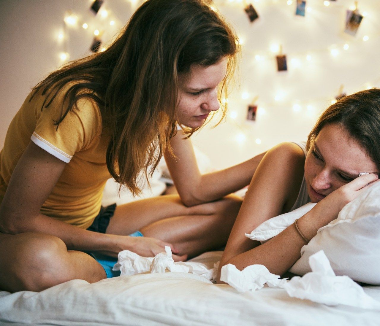 Friend comforting broken hearted woman - showing comfort, support, and friendship