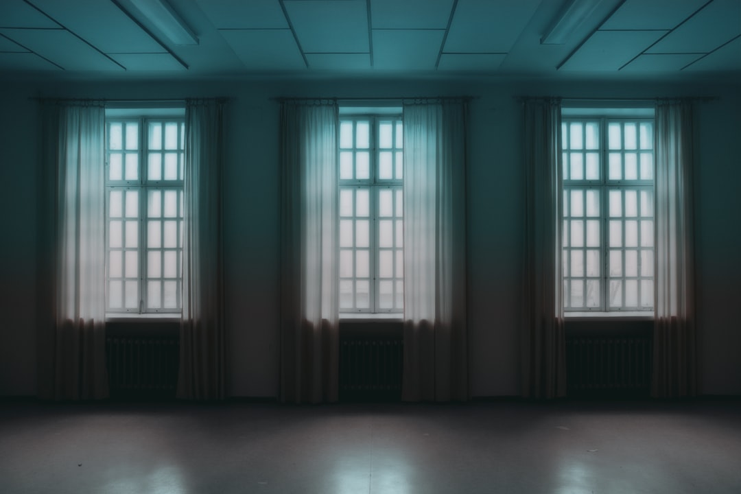 Room with three high windows