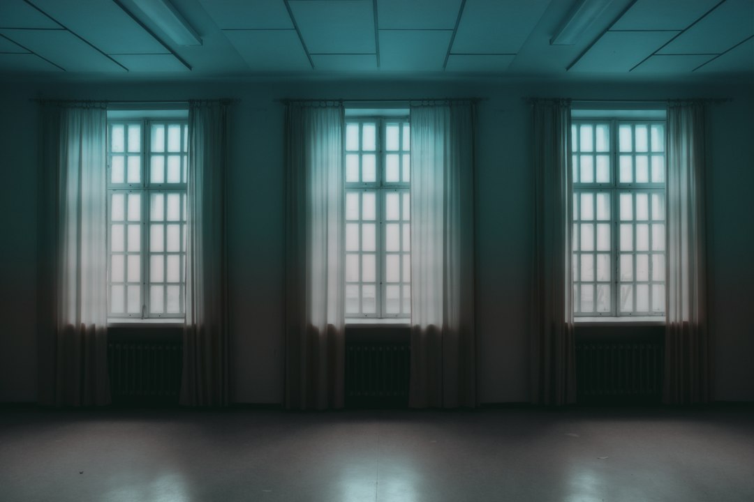 Room with three high windows